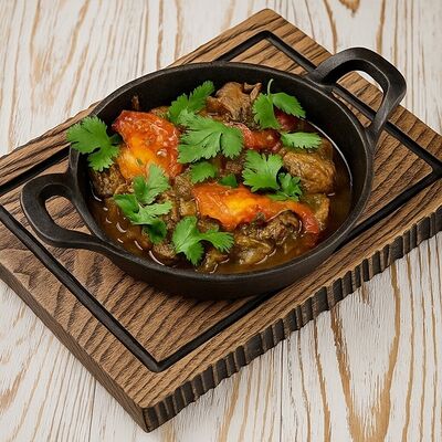 Баранина томленая с томатами в Тут харчо по цене 1050 ₽