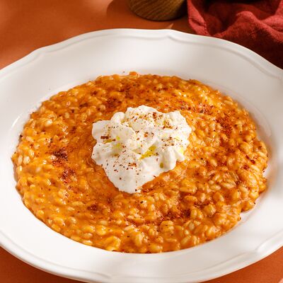 Ризотто с песто из вяленых томатов и страчателлой в Маймун по цене 950 ₽