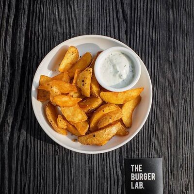 Картофельные дольки в The burger lab по цене 320 ₽