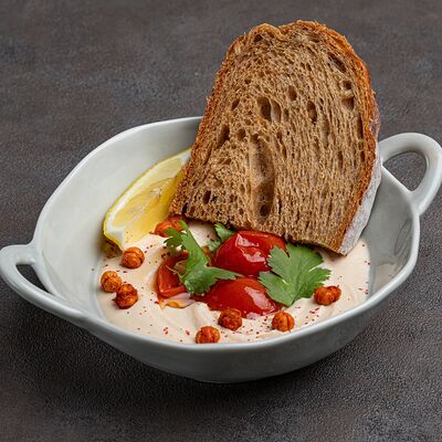 Хумус из белой фасоли в МОСТ бистро по цене 450 ₽