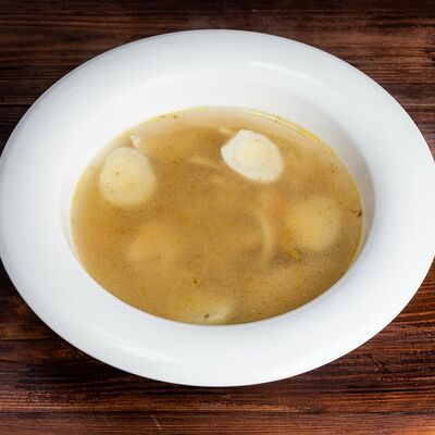 Суп-лапша с курицей и яйцом в Трактир Колесо по цене 253 ₽