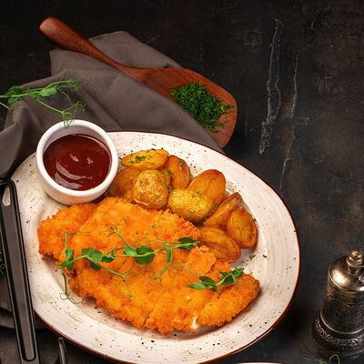 Шницель с бэби картофелем в Lamore Mio по цене 600 ₽