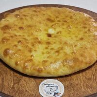 Осетинский пирог с сыром и зеленьюв Райский дворик