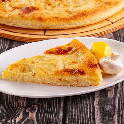 Пирог с картофелем и грибамив Осетинские Пироги по цене 1100 ₽