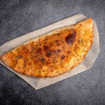 Кальцоне в Pizza Lavka по цене 499 ₽