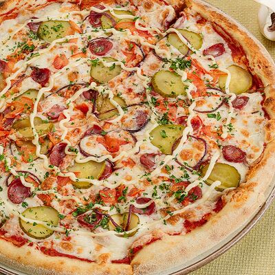 Пицца по-домашнему в Паста Фэмили по цене 920 ₽