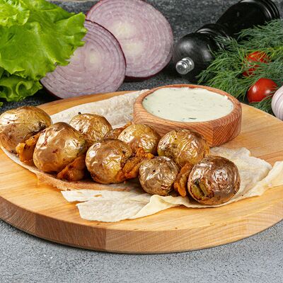 Молодой картофель с курдюком на мангале в Meat Street по цене 260 ₽
