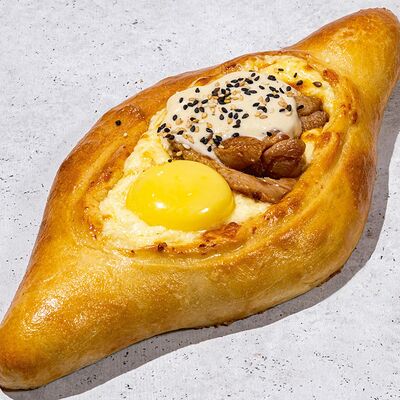 Хачапури по-аджарски с курицей в Антрекот по цене 565 ₽