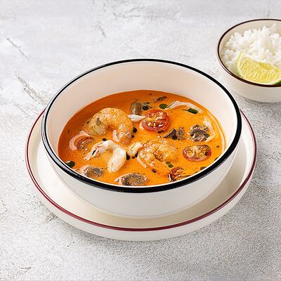 Том ям с кальмаром, креветками, томатами черри в Шоколадница по цене 790 ₽