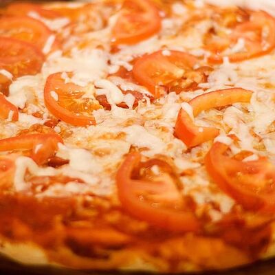 Пицца по-домашнему в Mangal House по цене 850 ₽