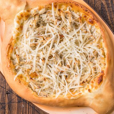 Хачапури по-аджарски Чкмерули в Каретный дворик по цене 850 ₽