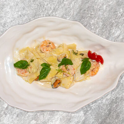 Паппарделе с морепродуктами в сливочном соусе в Встреча по цене 1050 ₽