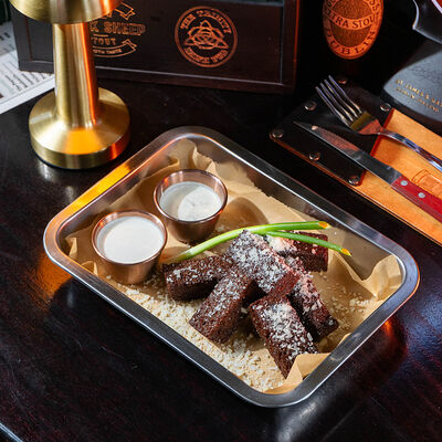 Чесночные гренки с пармезаном в Ирландский паб Тринити по цене 490 ₽