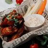 Куриные крылья с соусом на выбор в Гастробар Без Повода по цене 520