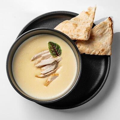 Сырный суп с цыпленком в Sunrise по цене 458 ₽