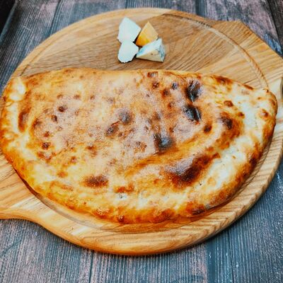 Кальцоне Четыре сыра в Парго Пицца по цене 760 ₽