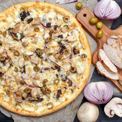Пицца с курицей и грибами в Жара по цене 750 ₽