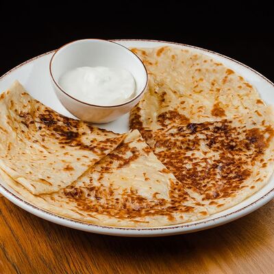 Хычин с сыром и картофелем в Родина южной кухни по цене 290 ₽