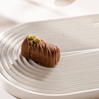 Конфета фисташковая в Кукумбер по цене 150 ₽