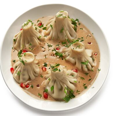 Классические мини -хинкали в перечном соусе в Хинкали и Вино по цене 435 ₽