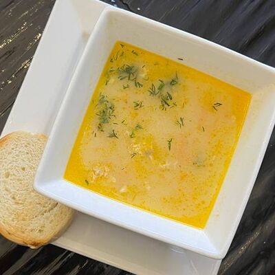 Суп рыбный с сыром и гренкой в Длинный нос по цене 180 ₽