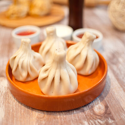 Вареные хинкали с говядиной и свининой в Амирани по цене 300 ₽