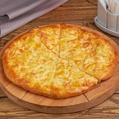 Осетинский пирог с мясом в Офицерское по цене 590 ₽