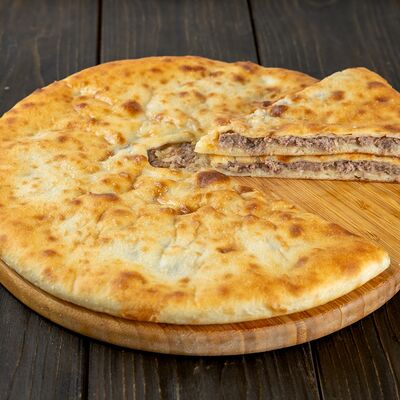 Пирог с мясом и картошкой в Осетинские пироги Вкусно Пироги по цене 1000