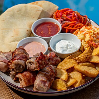 Шашлык из индейка в беконе на углях с гарниром в АЛЯ РУСЪ по цене 690 ₽