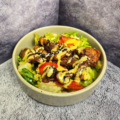 Теплый салат с куриной печенью в медово-горчичной заправке в Сытый гусь по цене 700 ₽