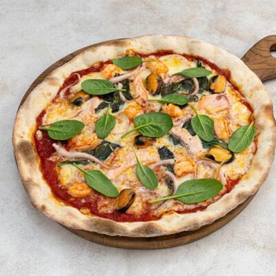 Пицца с морепродуктами в Osteria Mario по цене 990 ₽