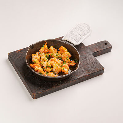 Тигровые креветки с чесноком и петрушкой в Сыроварня по цене 197000 сум