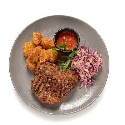 Стейк из свиной шеи с салатом коул-слоув CITYBAR по цене 560 ₽