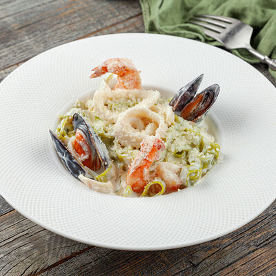 Тальятелле шпинатные с морепродуктами в Трапезная по цене 860 ₽