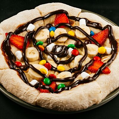 Пицца сладкая M&Ms в Горки парк по цене 790 ₽