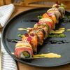 Ролл из четырех видов рыбы в Nikkei Sushi Premium по цене 1190