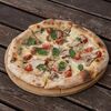 Пицца с курицей, шампиньонами и томатами в MADE LOVE PIZZA по цене 920