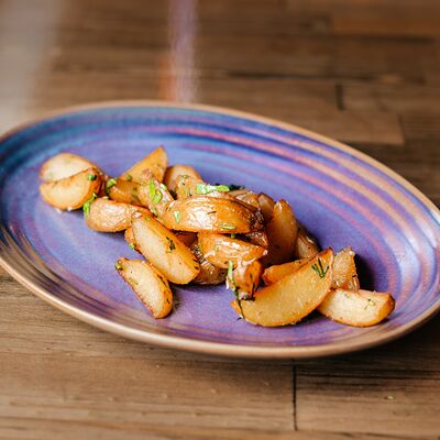 Картофель бэби с розмарином в Булл Вар по цене 369 ₽