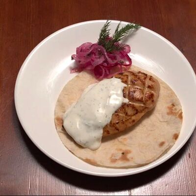 Куриное филе под сметанным соусом в Dance&grillpark по цене 410 ₽