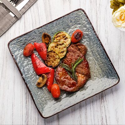 Стейк из свинины с овощами на гриле в Мука по цене 1440 ₽