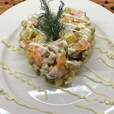Салат Оливье в Чайхана тандыр по цене 150 ₽