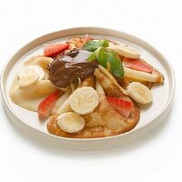 Блинчики с нутеллой, бананом и клубникой в Шоколадница