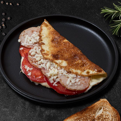 Омлет с ветчиной и томатами в In Tasty по цене 360 ₽
