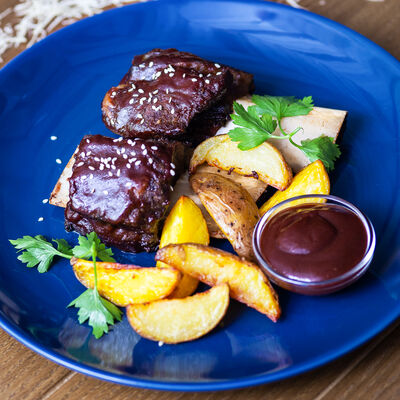 Ребра говядины в соусе Барбекю в На Веранде по цене 450 ₽