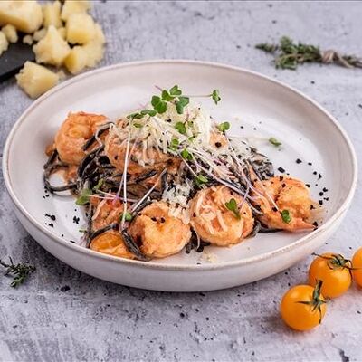 Черные спагетти с креветками в Refettorio по цене 850 ₽