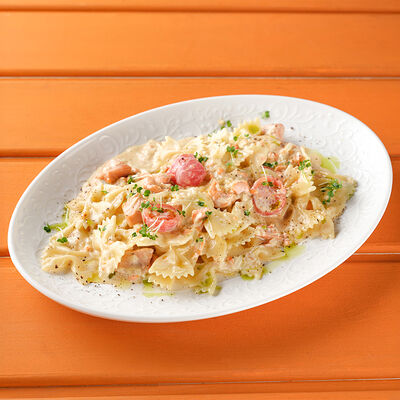 Фарфалле с форелью и томатами в Сорренто by Novikov по цене 1580 ₽