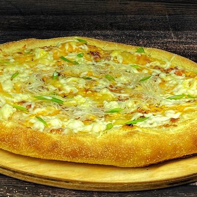 Наша пицца Четыре Сыра в Поедем поедим по цене 500 ₽