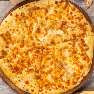 Хачапури с сыром и зеленью в Грузинское кафе Ван Гоги по цене 325 ₽