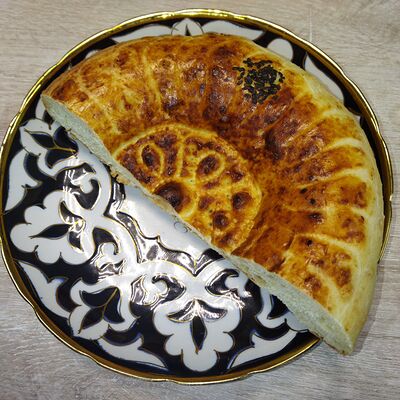 Половина лепешки Узбекской в Уютное кафе по цене 70 ₽