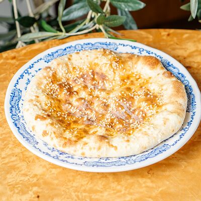 Пита с кунжутом в Grecco по цене 350 ₽